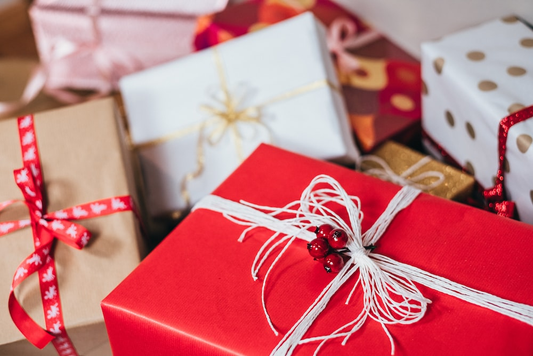 many wrapped boxes of presents