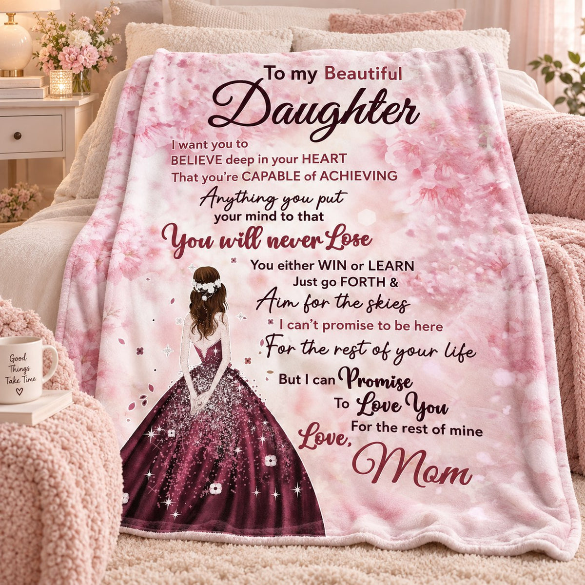 Pink Win or Learn daughter blanket from Mom draped over a cozy bed in a pink bedroom